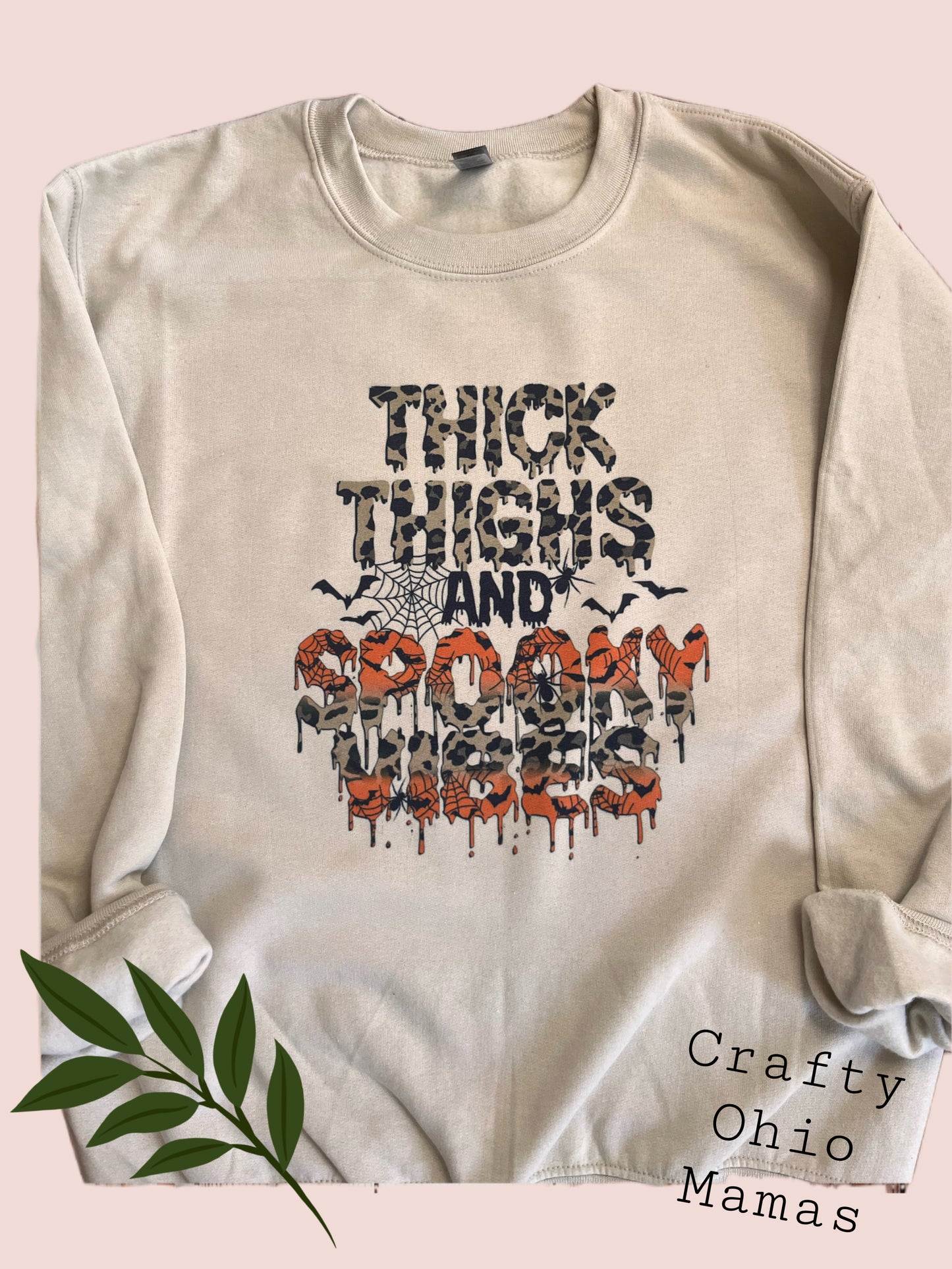 Thick thighs and spooky vibes crew neck